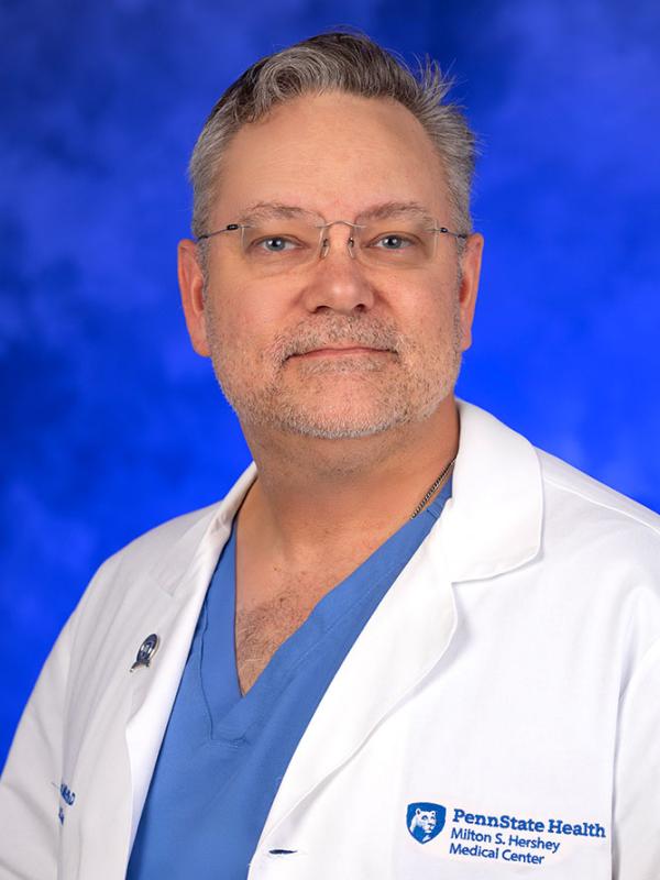 E. Scott S. Halstead, MD,  PhD