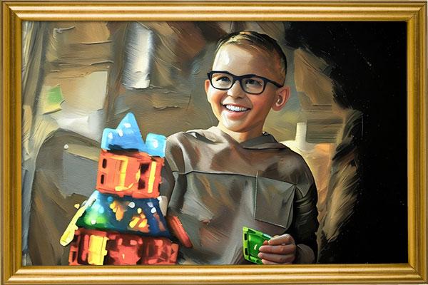 Young male with a big smile on his face playing with toys.