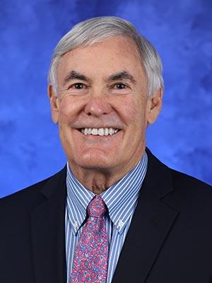 James Broach, in a professional head and shoulders photograph.