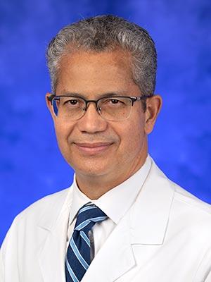 Kevin Cockcroft, MD, in a professional head and shoulders photograph.