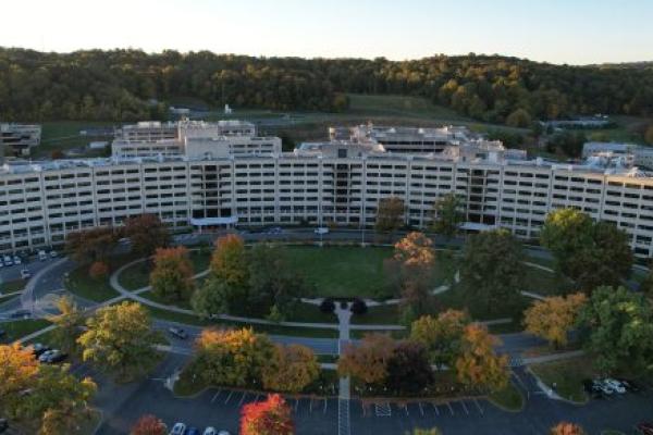 Penn State College of Medicine crescent building shown from above in an image taken by drone