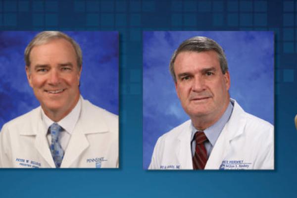 Dr. Peter Dillon and Dr. Donald Mackay are featured wearing lab coats on a background with the Penn State Nittany Lion statute.