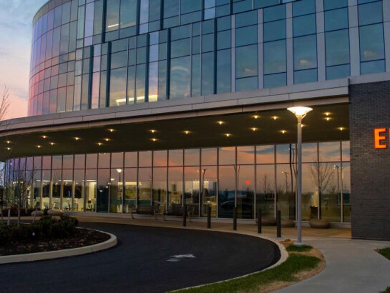 Exterior image at sunset of hospital emergency room