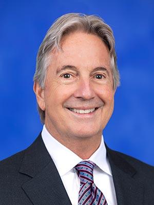 Joseph Frank, in a professional head and shoulders photograph.