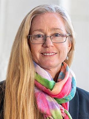 Patricia Sue Grigson, PhD, in a professional head and shoulders photograph.