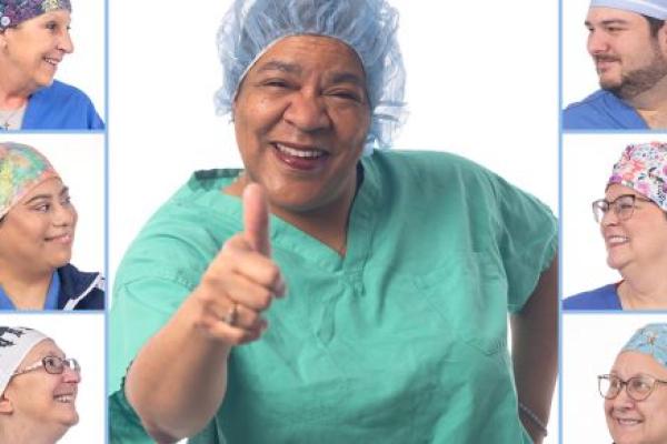 Group of health care workers in different styled scrub caps, featuring floral, cartoon and abstract designs, showcasing their unique personalities and styles.
