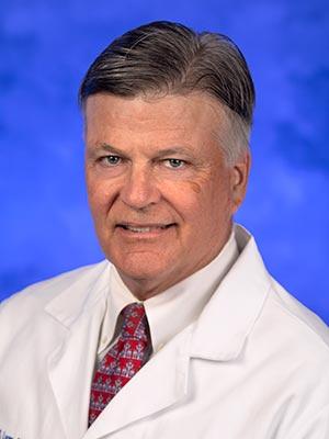 Richard Legro, MD, in a professional head and shoulders photograph.