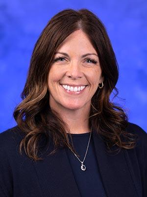 Erica Lenc, MS, CCC-SLP professional head and shoulders photograph.