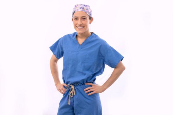 Young female posing with a smile on her face.