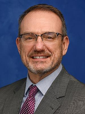 Randy Morris, in a professional head and shoulders photograph.