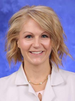 Nicole Osevala in a professional head and shoulders photograph