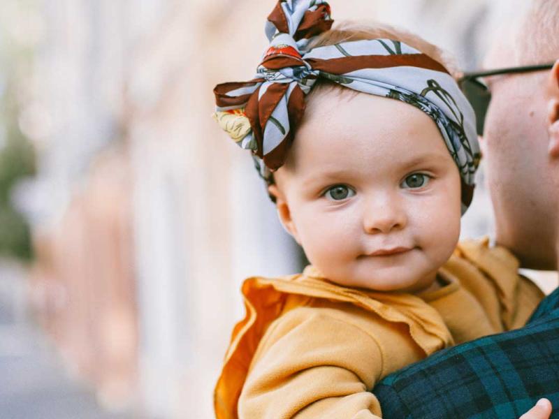 Father Carrying a Baby