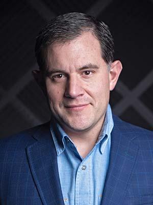 Philip Brenckle in a professional head and shoulders photograph.