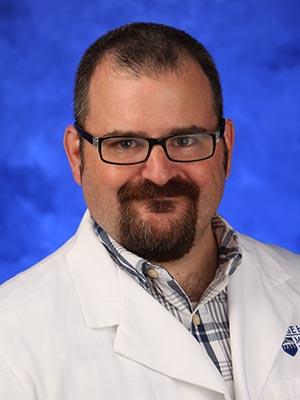 Shawn Phillips, in a professional head and shoulders photograph.