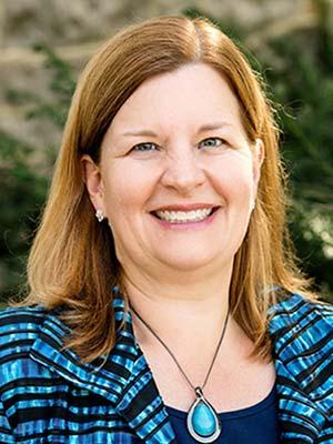 Sara F. Thorndike, in a professional head and shoulders photograph.