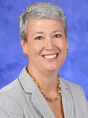 Sheilah Borne, in a professional head and shoulders photograph.