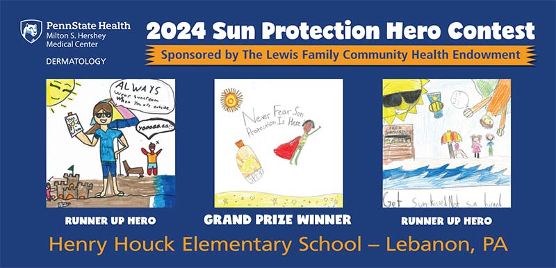 The first place winning poster is pictured center with the second place winner on the right and the third place winning poster on the left.