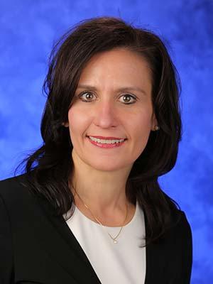 Tracy Moyer in a professional head and shoulders photograph.