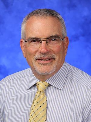 Ronald Wilson, in a professional head and shoulders photograph.